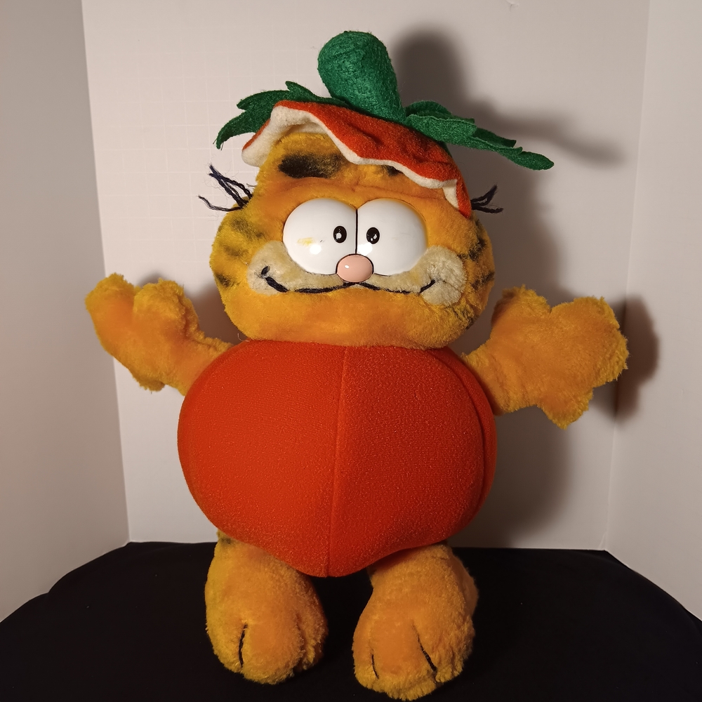 Dakine Orange Plush Toy with Yellow Accents